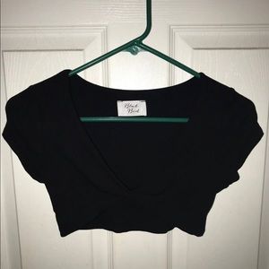 Black crop top/cross in the front